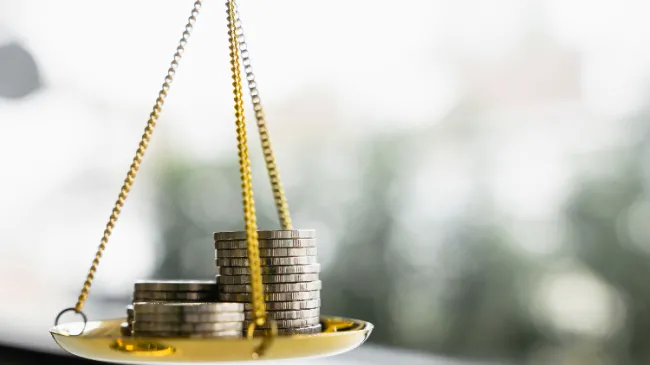 scale with coins